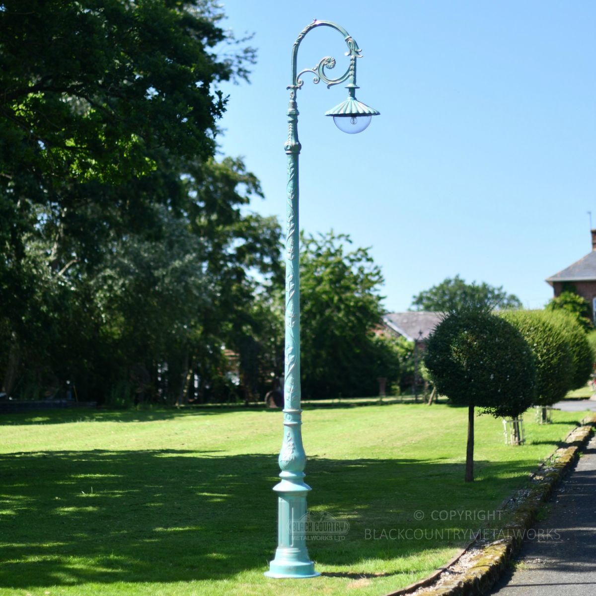 Pale Blue and Gold Cast Iron Garden Lamp Post Installed On Driveway Edge Pale Blue and Gold Cast Iron Garden Lamp Post Installed On Driveway Edge