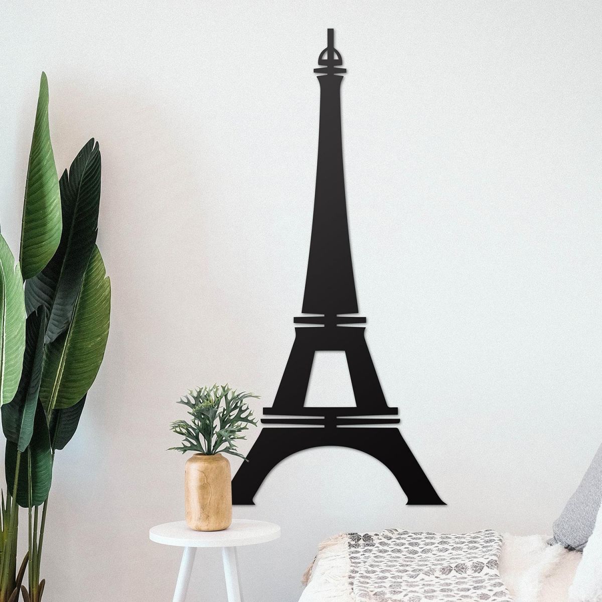 Paris Eiffel Tower Wall Art on the Wall Next to Plants Paris Eiffel Tower Wall Art on the Wall Next to Plants