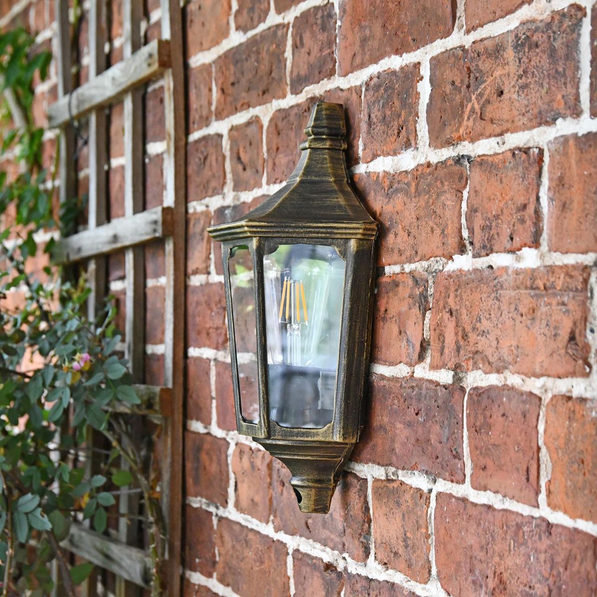 Sid View of the "Penley" Flush Wall Light Mounted o a Brick Wall