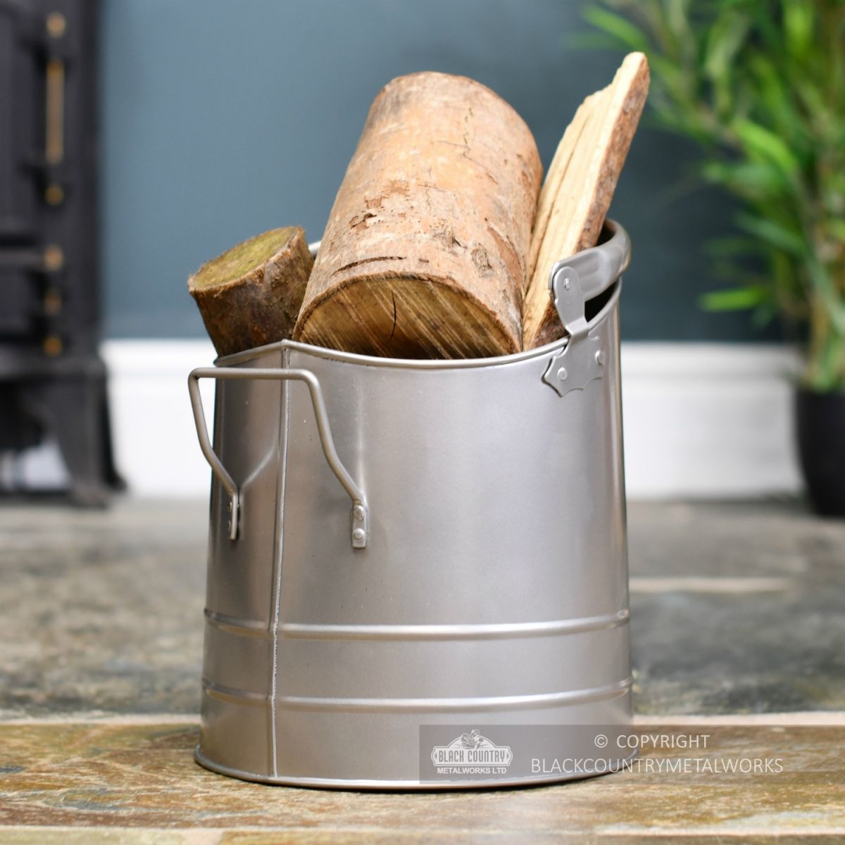 Pewter Finish Traditional Fireside Log and Coal Bucket Holding Wood Pewter Finish Traditional Fireside Log and Coal Bucket Holding Wood