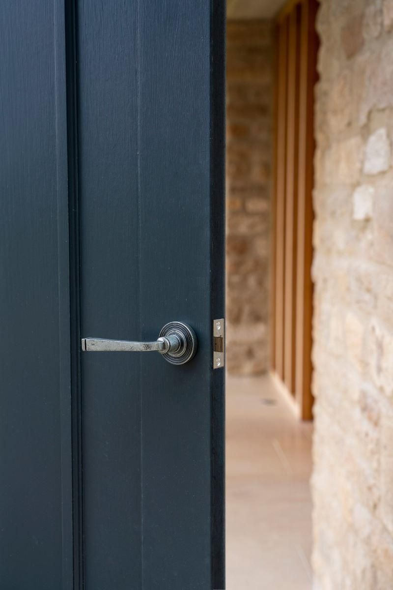 Pewter Round Lever Door Handle on Beehive Rose in Situ Pewter Round Lever Door Handle on Beehive Rose in Situ