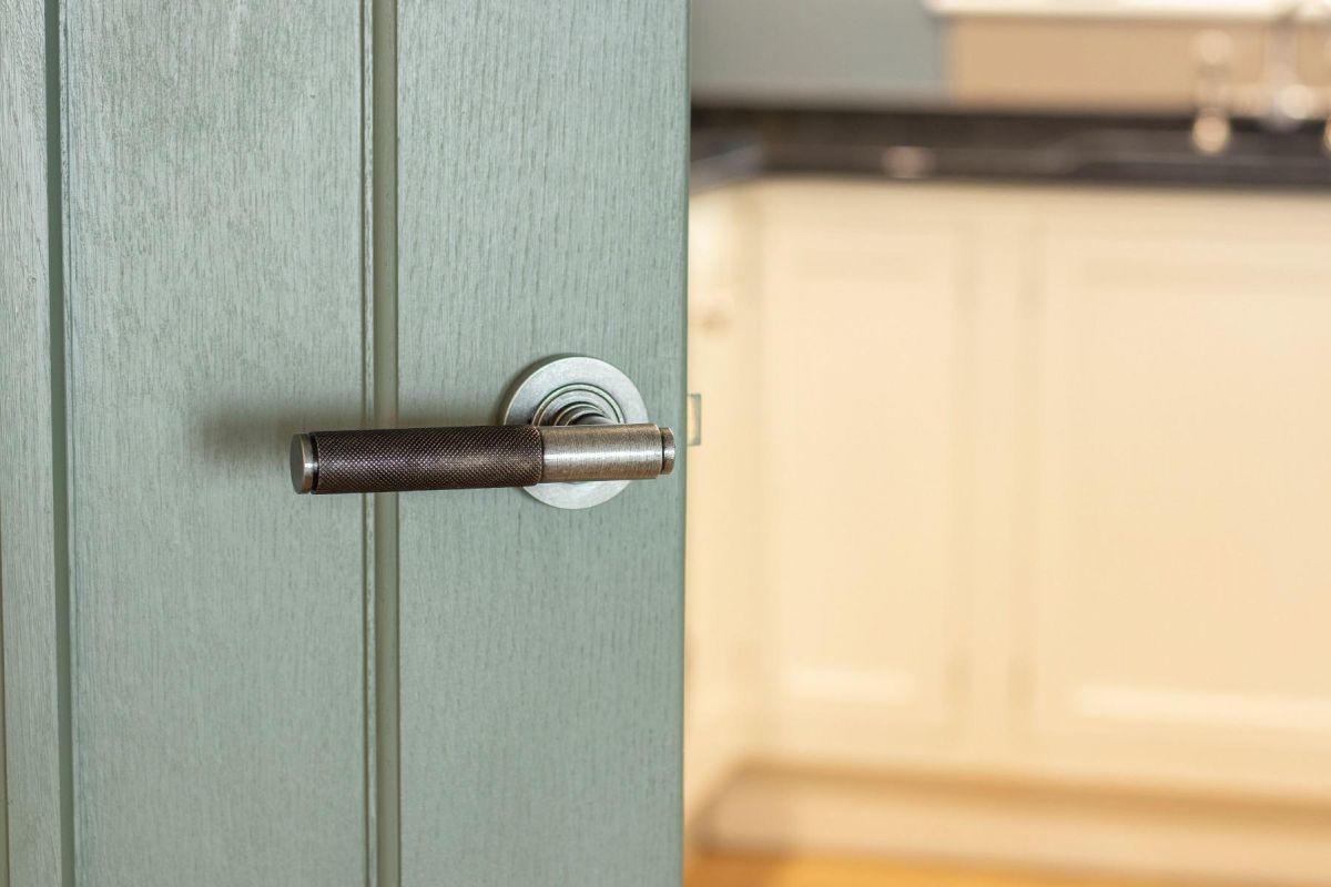 Pewter Textured Lever Door Handle on Rose on Door Pewter Textured Lever Door Handle on Rose on Door