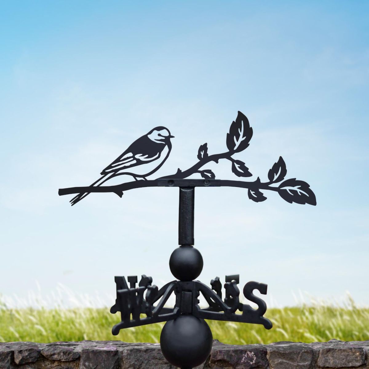 Pied wagtail weathervane on the countryside Pied wagtail weathervane on the countryside