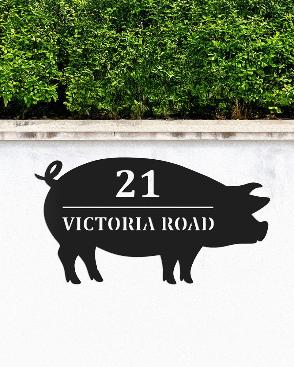 Black Pig Steel House Name Sign in Situ on a Garden Wall