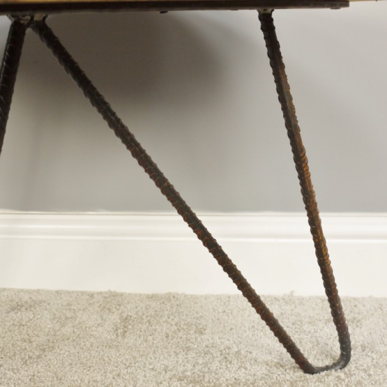 Close-up of the Iron Pin Legged on the Coffee Table