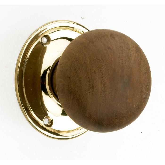 Polished Brass Door Handle in an Wooden Finish