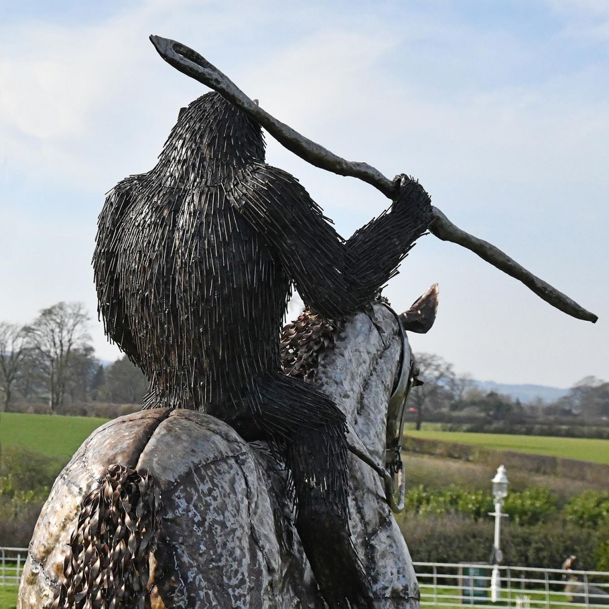 View of the Back of "Caesar" From Planet of the Apes Riding Horse  View of the Back of "Caesar" From Planet of the Apes Riding Horse