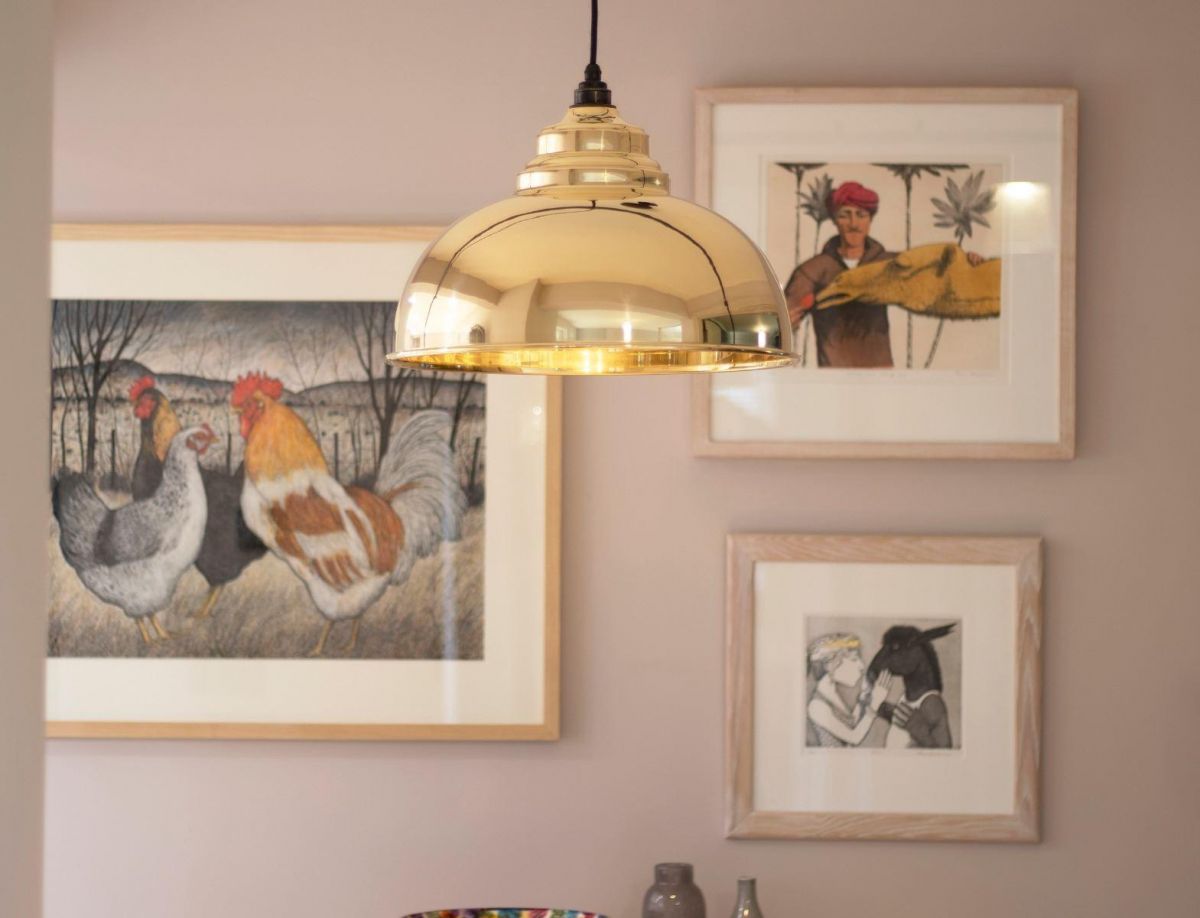 Polished Brass Curved Hanging Pendant Light with Smooth Brass Interior in Situ