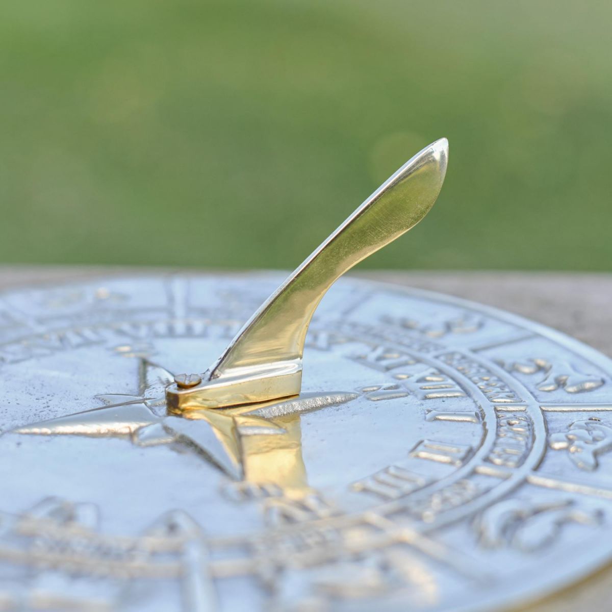 Close-Up of Polished Brass Sundial 