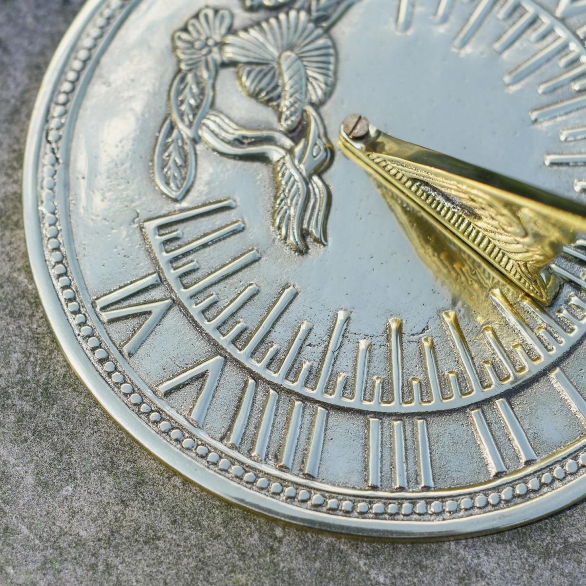 Close-Up of Polished Brass Finish on Hummingbird Sundial