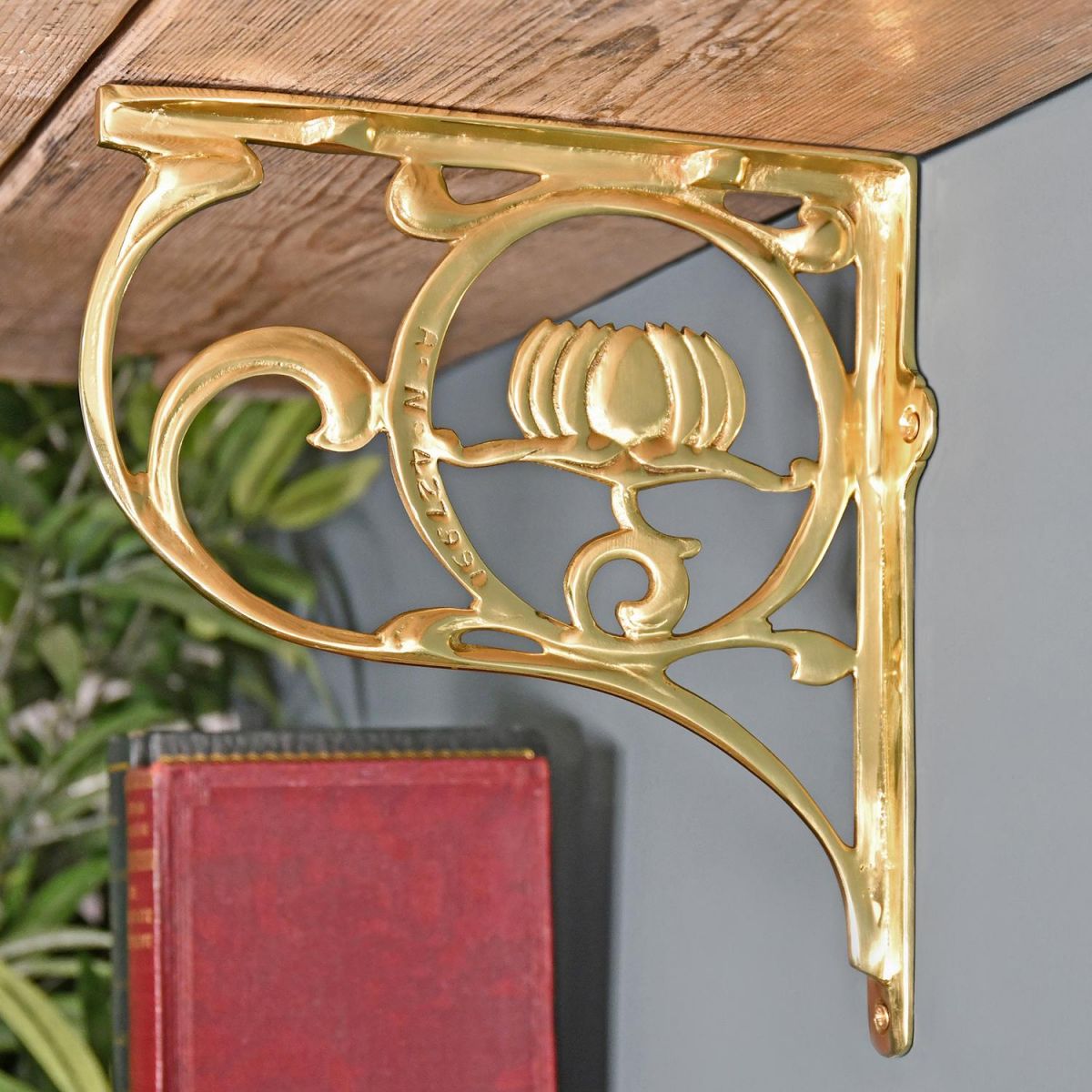 Polished Brass Lotus Flower Shelf Bracket in Situ