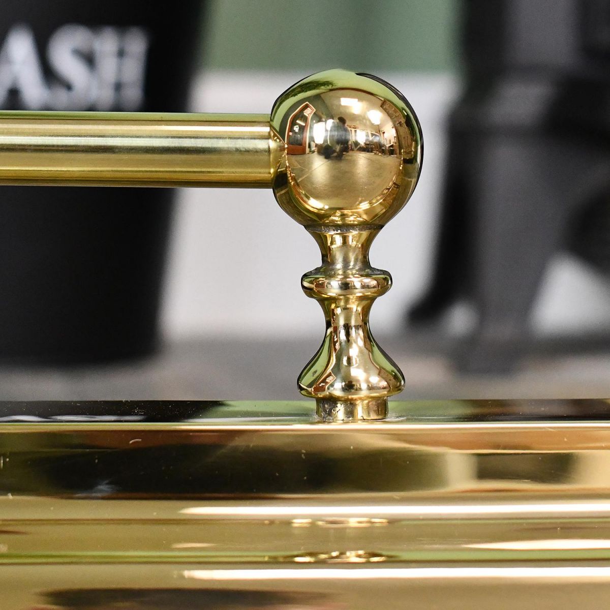 Close-up of the Ball Finial on the Railing of the Hearth Fender