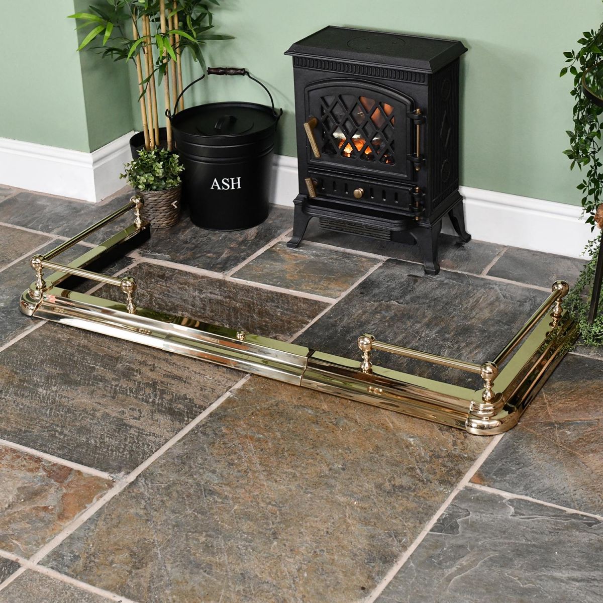 Polished Brass Simplistic Railed Hearth Fender in Situ Next to the fire Place