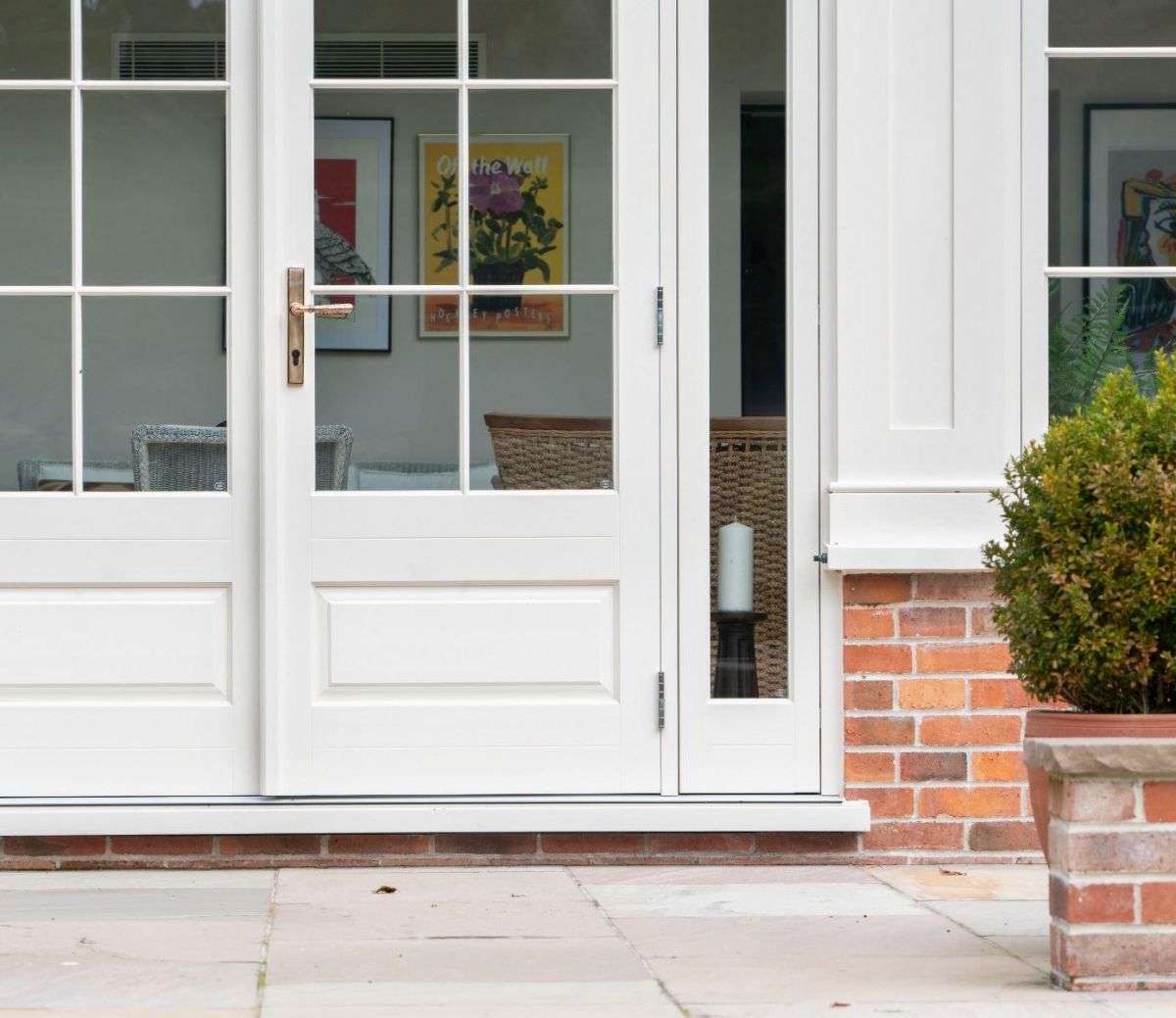 Polished Copper Hammered Slimline Lever Door Handle in Situ