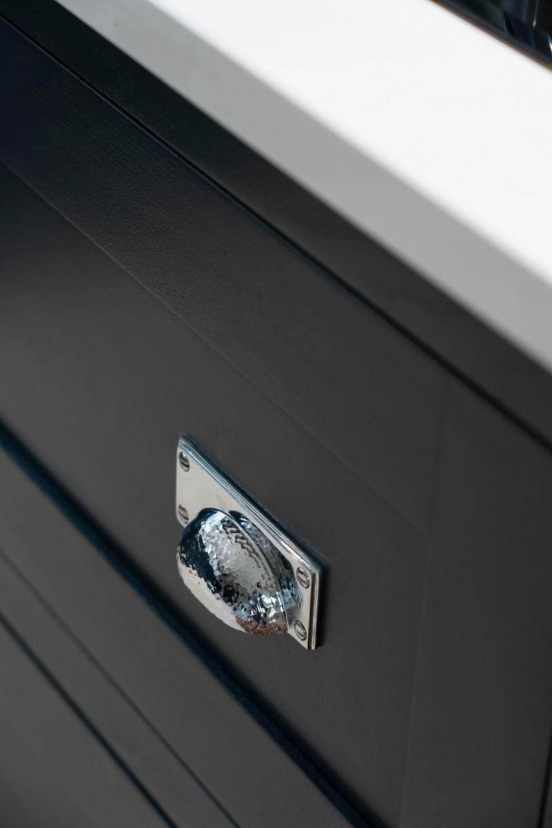 Polished Chrome Rectangular Drawer Pull with Curved Hammered Handle on Drawers