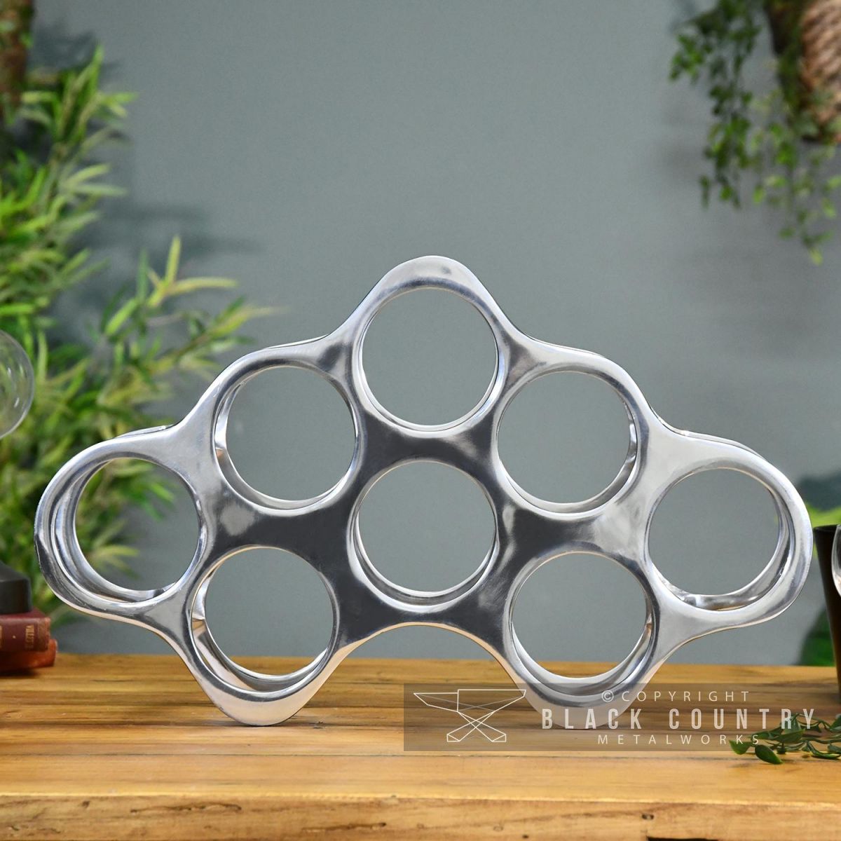 Front View of the Polished Nickel "Cloud" Wine Rack