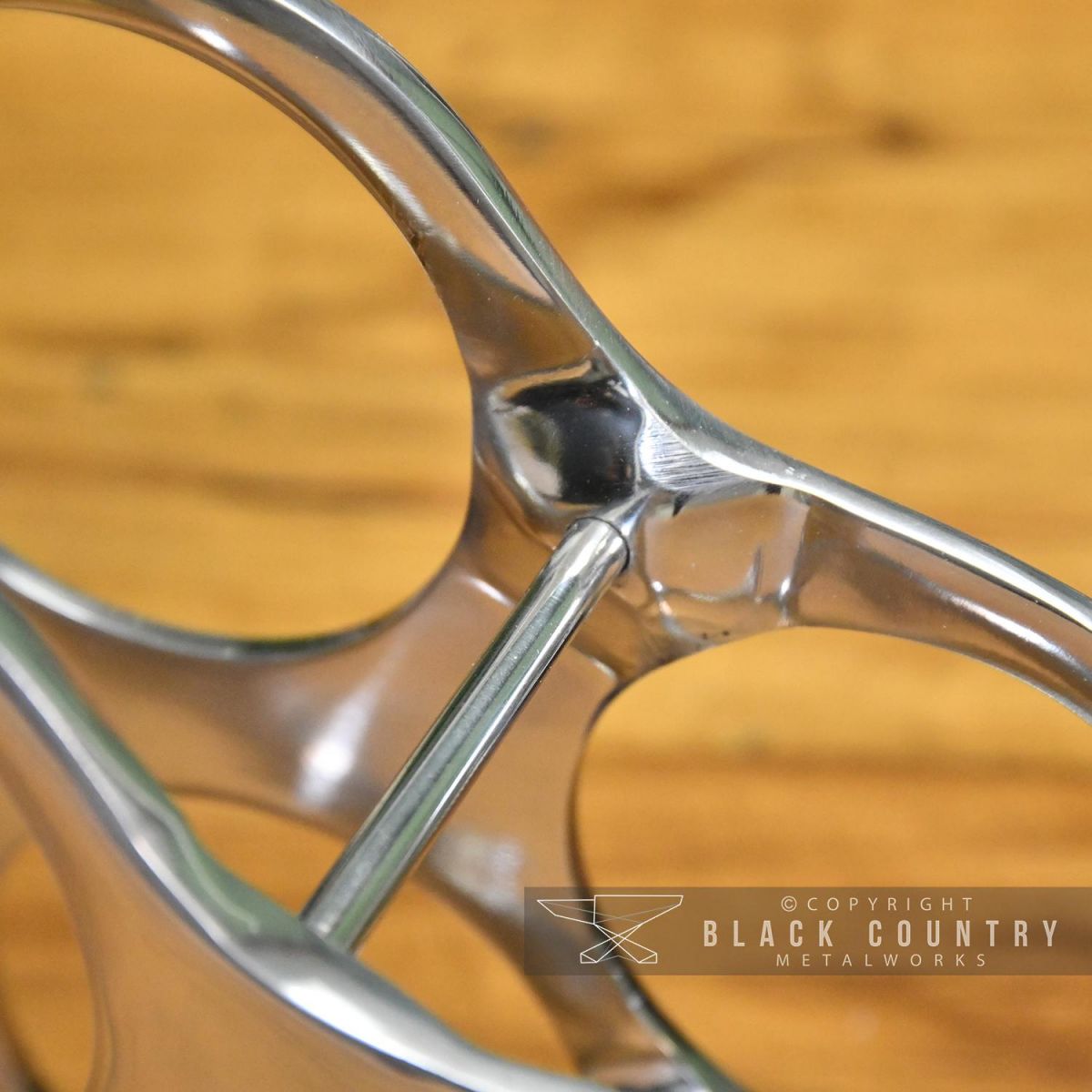 Top View of the Polished Nickel "Cloud" Wine Rack