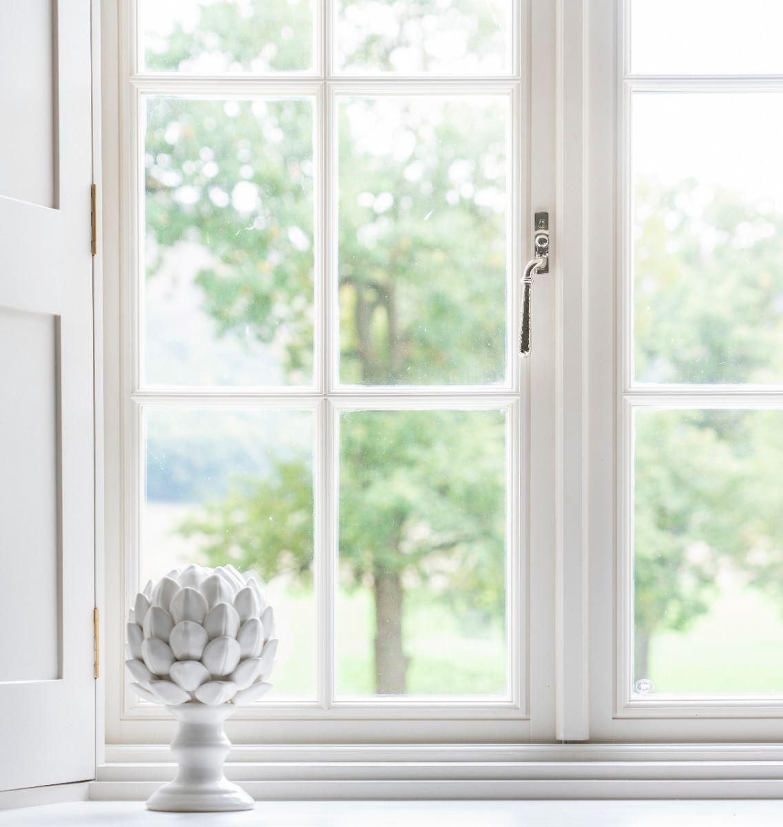 Polished Nickel Hammered Espag Window Handle - Left Handed on Window Polished Nickel Hammered Espag Window Handle - Left Handed on Window