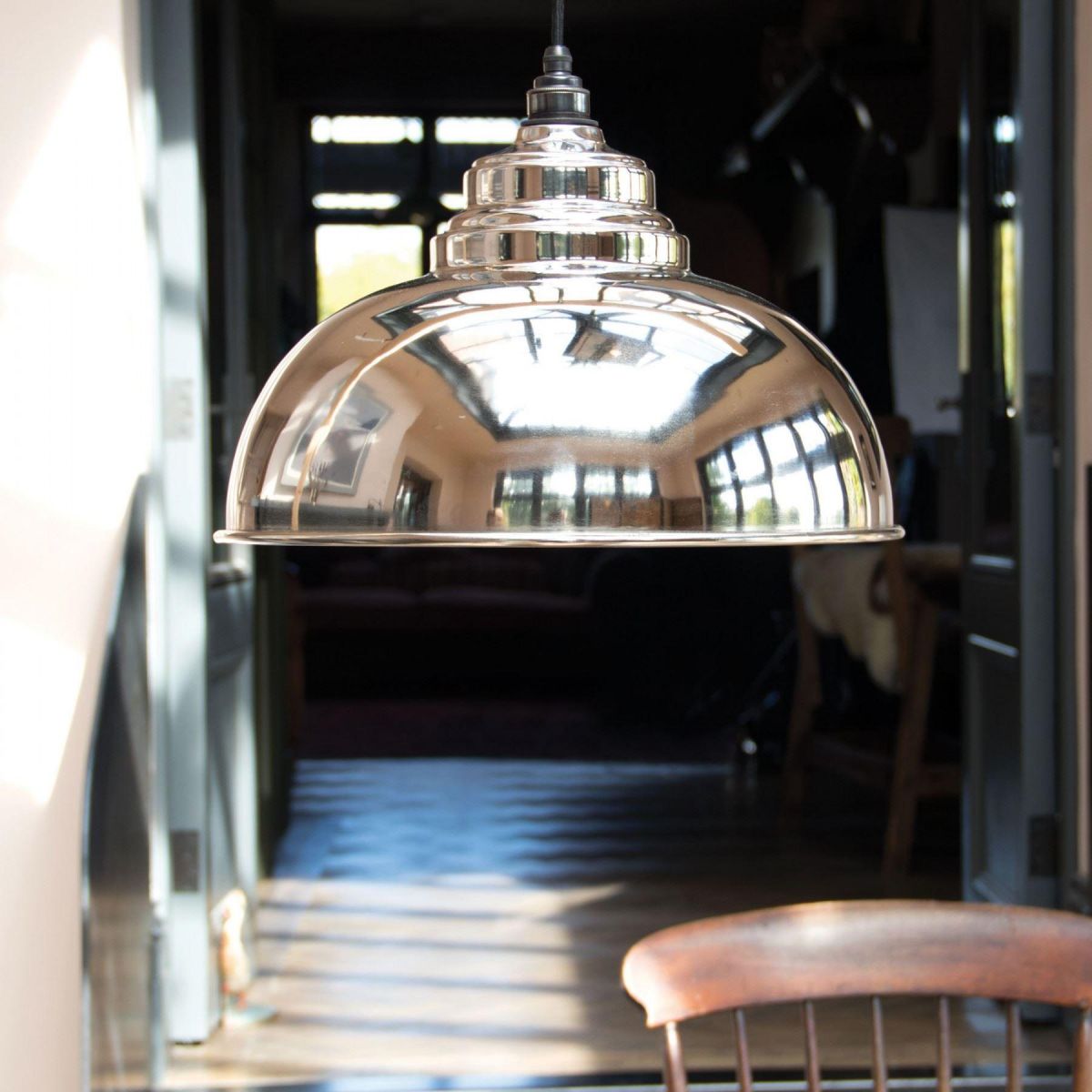 Polished Nickel Curved Interior Hanging Pendant in Situ