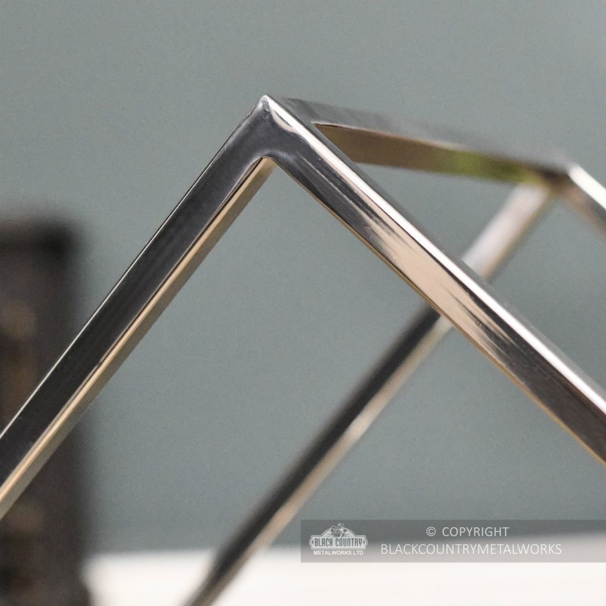 Polished Steel Contemporary Log Store Close Up Polished Steel Contemporary Log Store Close Up