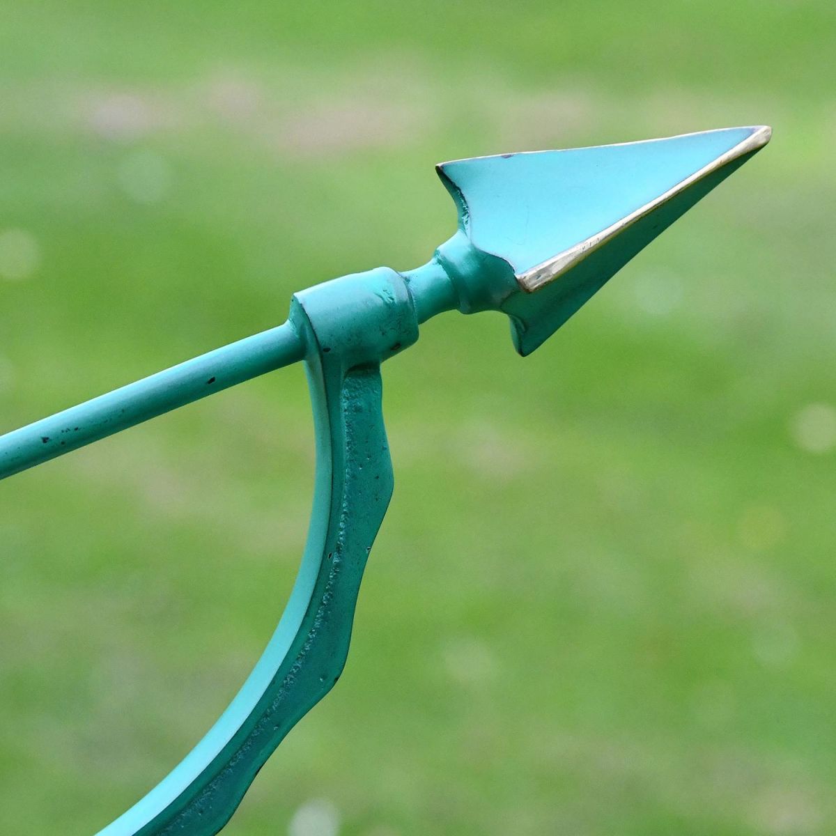Close-up of the Arrow on the End of the "Pompeii" Verdigris Armillary