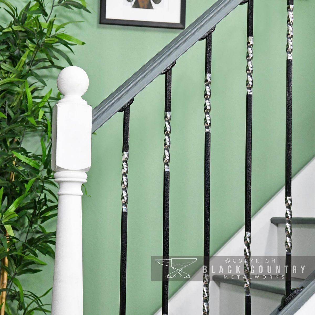 "Rabanne" Stainless Steel Stair Spindle in Situ on a Stair Case "Rabanne" Stainless Steel Stair Spindle in Situ on a Stair Case