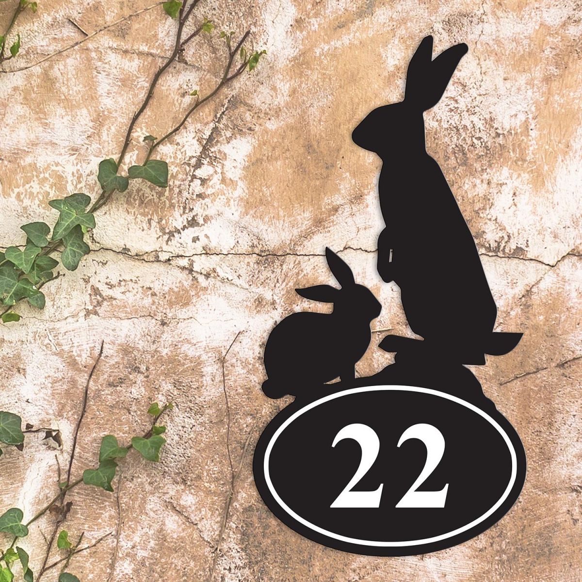 Rabbit Iron House Number Sign in Situ on a Rustic Wall 