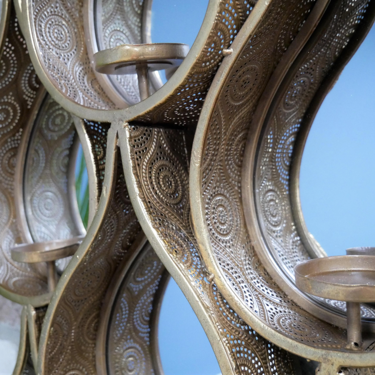 Close-up of the Gold Ornate Pattern on the Mirror