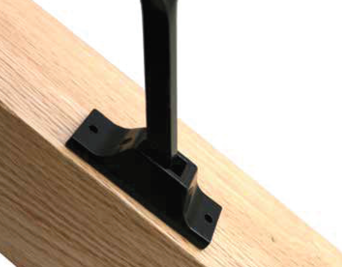 Black spindle bracket on stair 