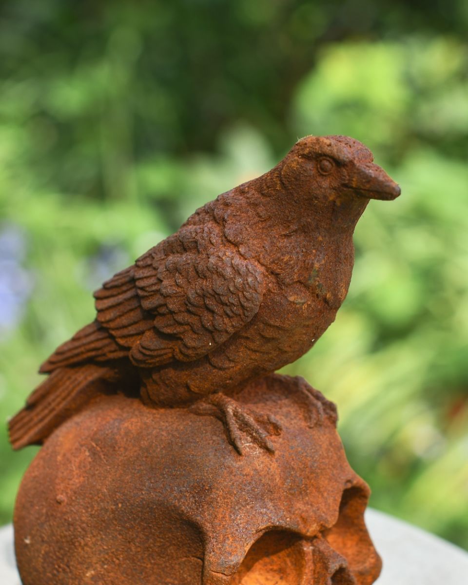 close up of raven detail on outdoor sculpture