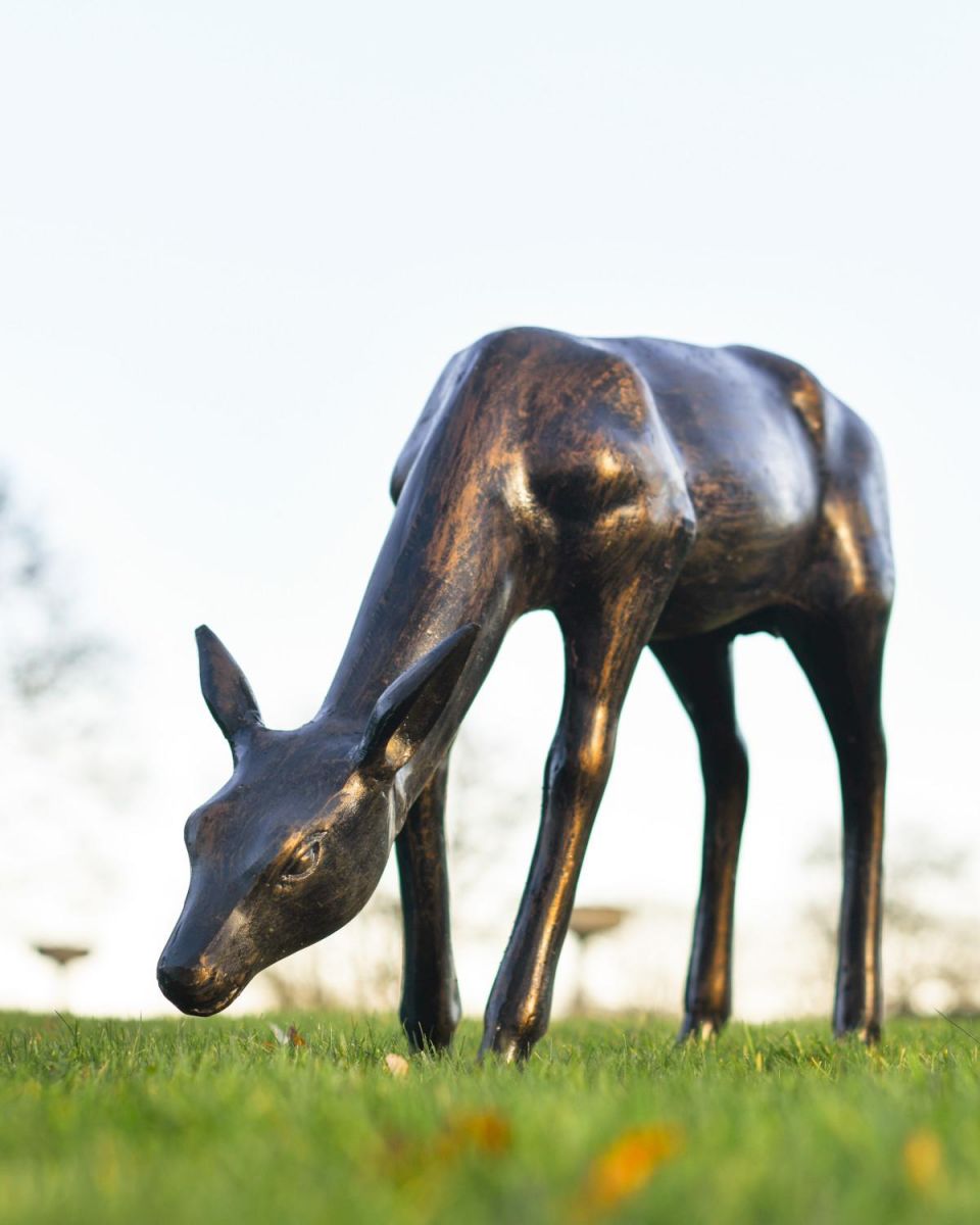 Recycled Cast Aluminium Antique Bronze Glimmer Grazing Doe Sculpture in Situ