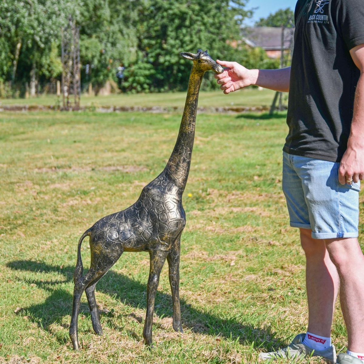 Scale Shot of Recycled Cast Aluminium Brushed Gold Giraffe Sculpture - 122cm