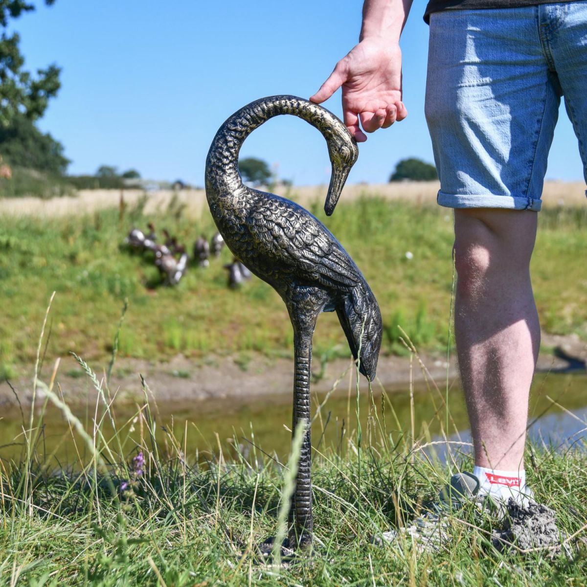 Scale Shot of Recycled Cast Aluminium Brushed Gold "Goliath" Heron Sculpture - Facing Backwards