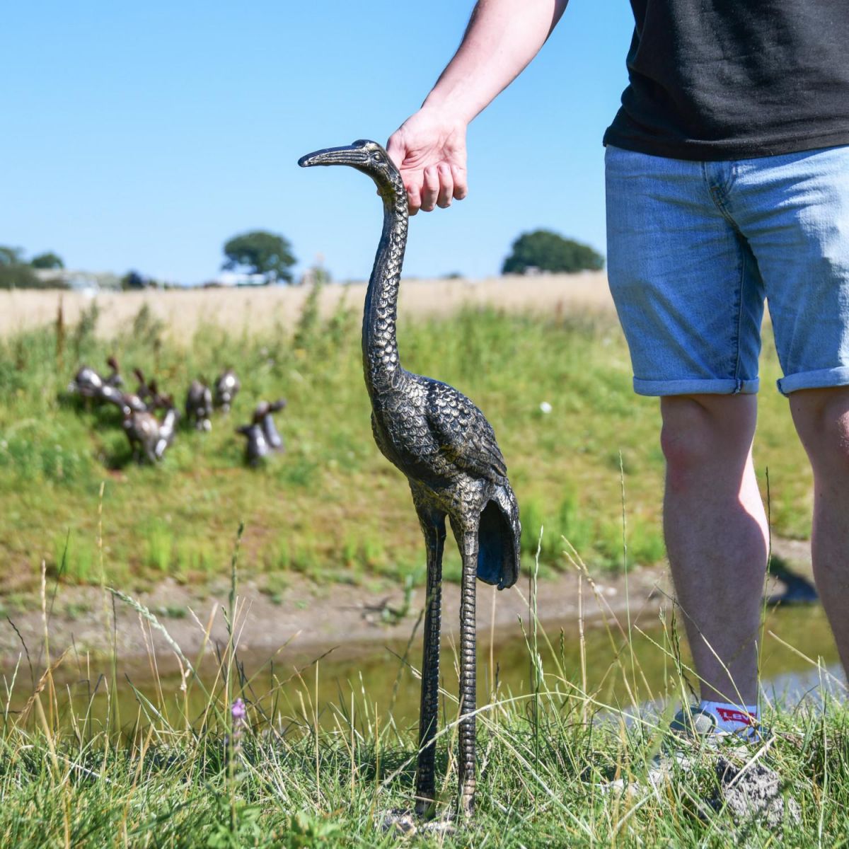 Scale Shot of Recycled Cast Aluminium Brushed Gold Goliath Heron Sculpture