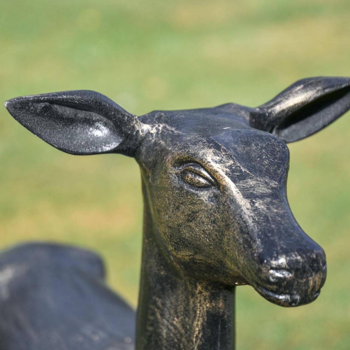 Close-Up of Doe Face on Deer Sculpture Close-Up of Doe Face on Deer Sculpture