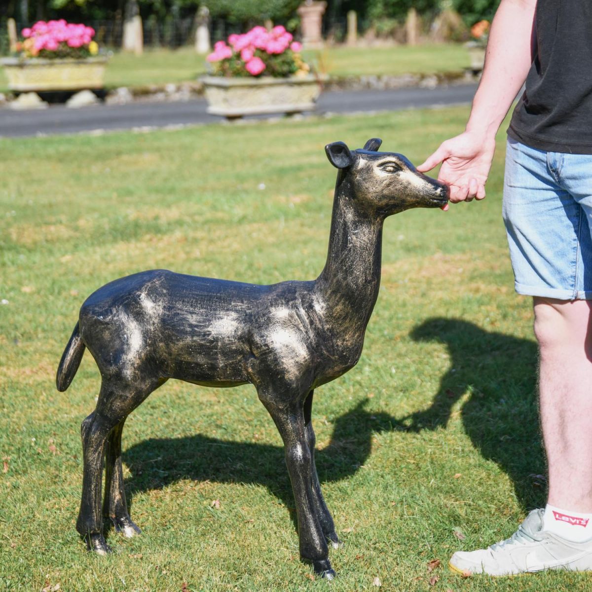 Scale Shot of Recycled Cast Aluminium Brushed Gold Regal Doe Sculpture Scale Shot of Recycled Cast Aluminium Brushed Gold Regal Doe Sculpture