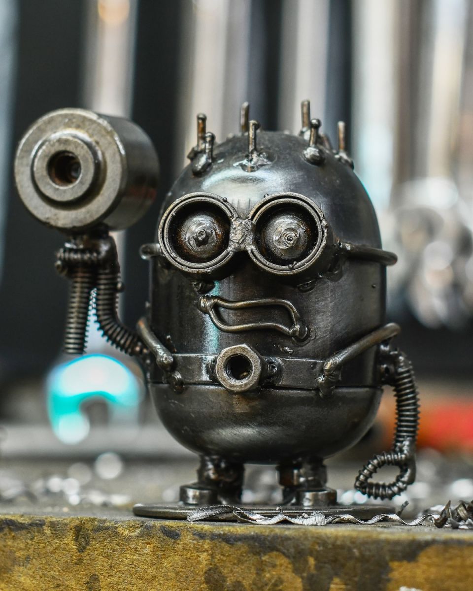 Recycled Metal "Armed Worker" Sculpture Recycled Metal "Armed Worker" Sculpture