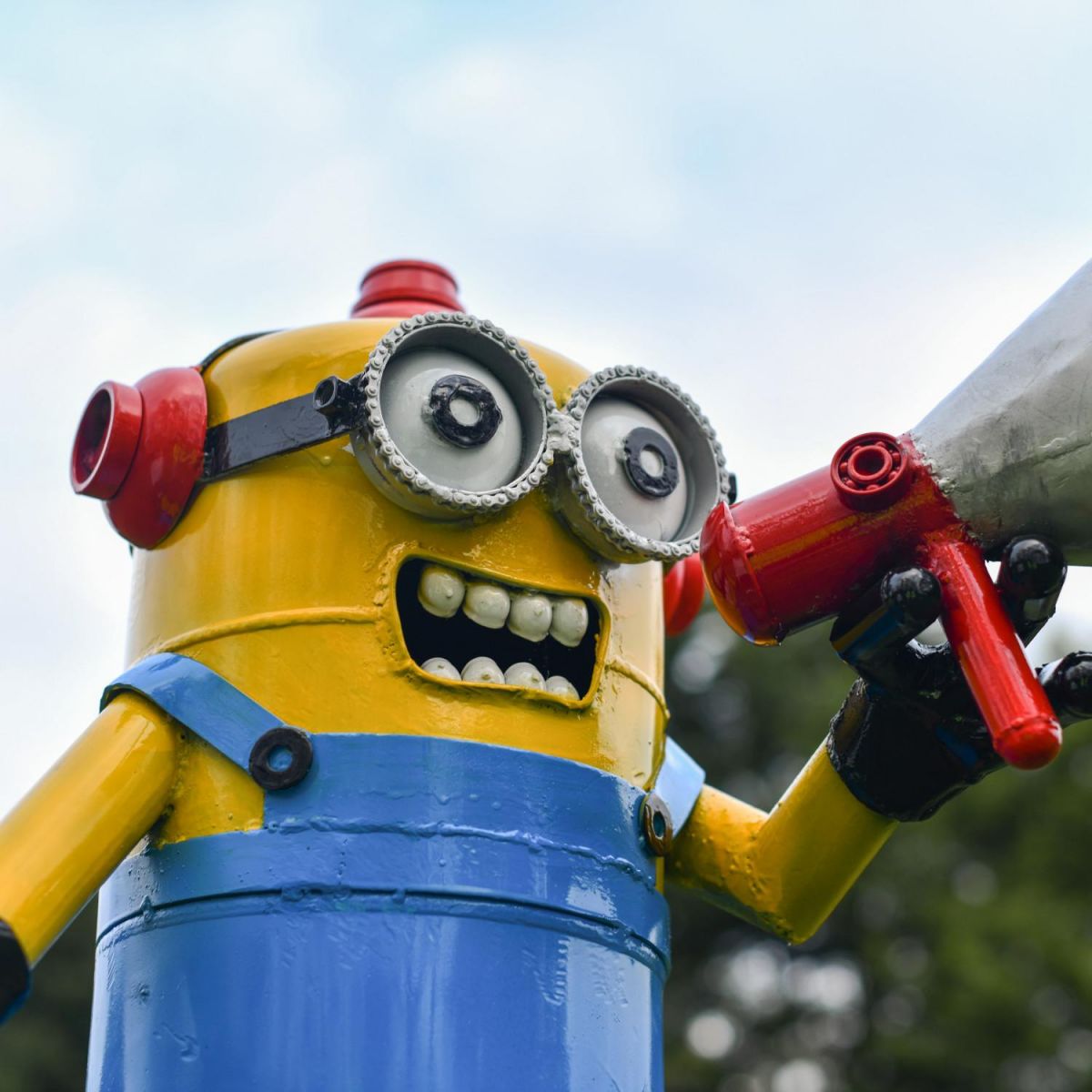 Close-Up of Recycled Metal "Emergency Call" Minion Sculpture