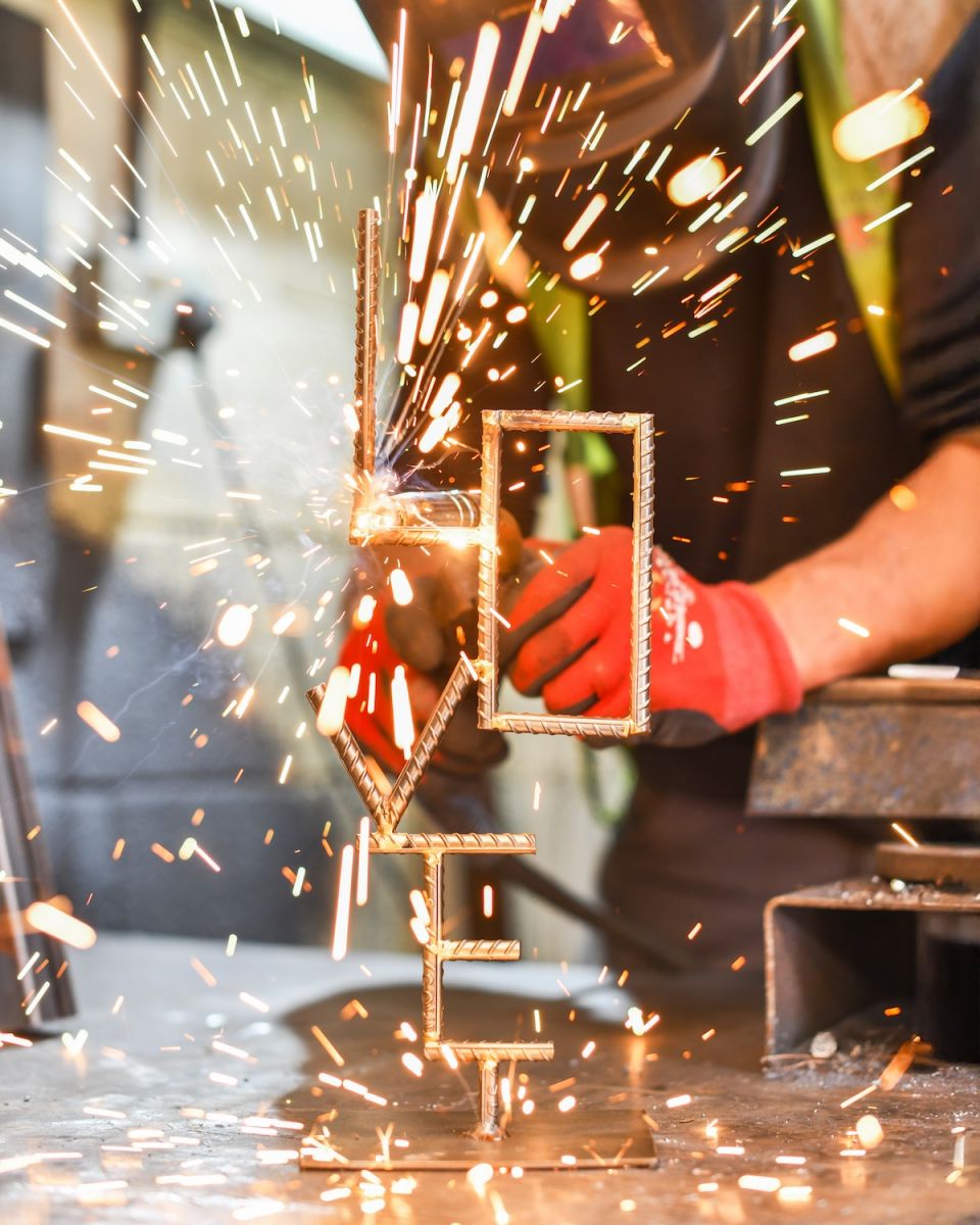 Scale image of Recycled Metal "LOVE" Sculpture
