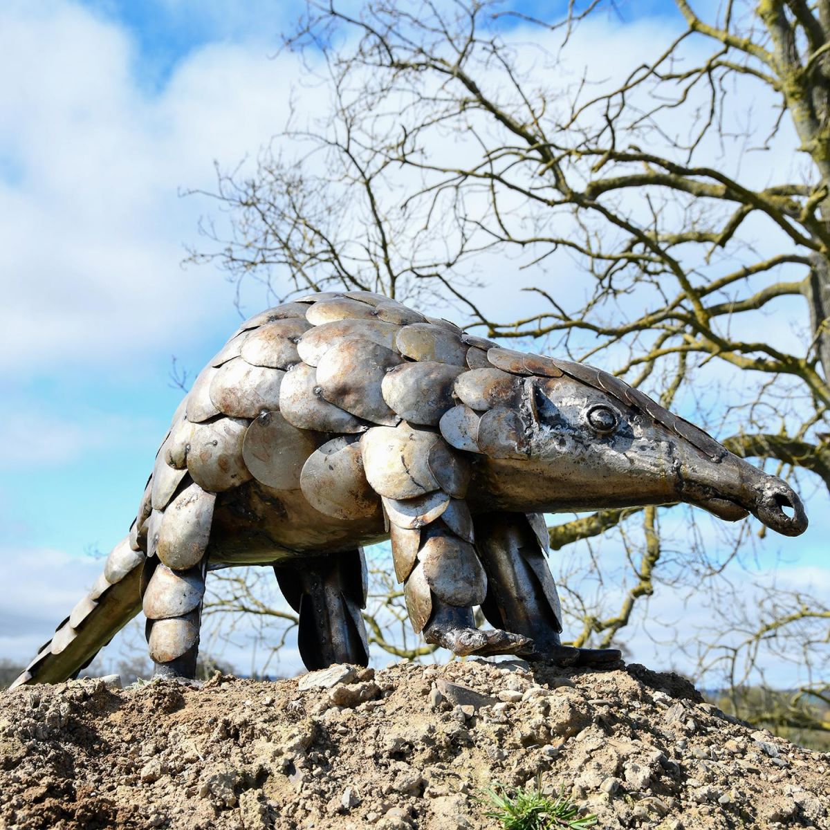 Recycled Metal Pangolin Sculpture on Display Outdoors