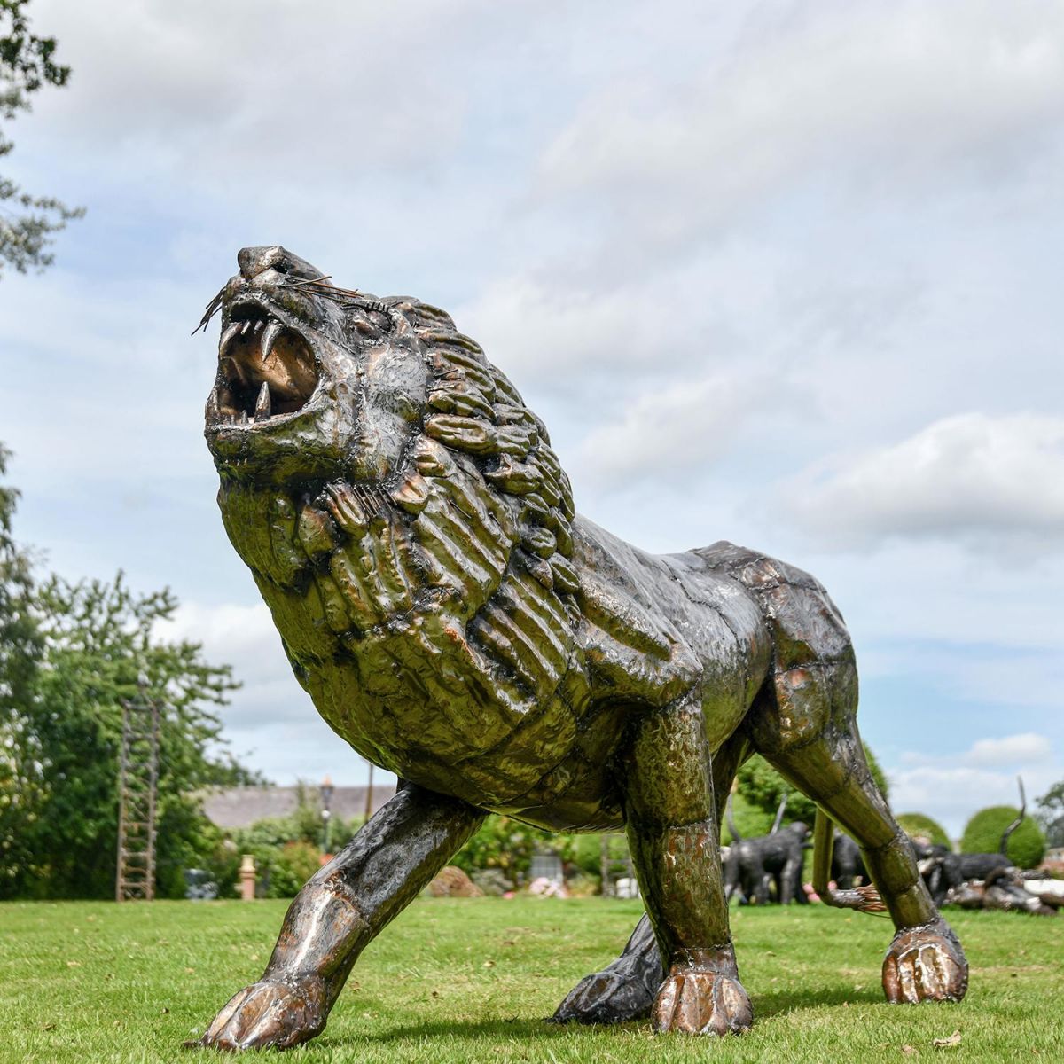 Recycled Metal Roaring Lion Sculpture in situ