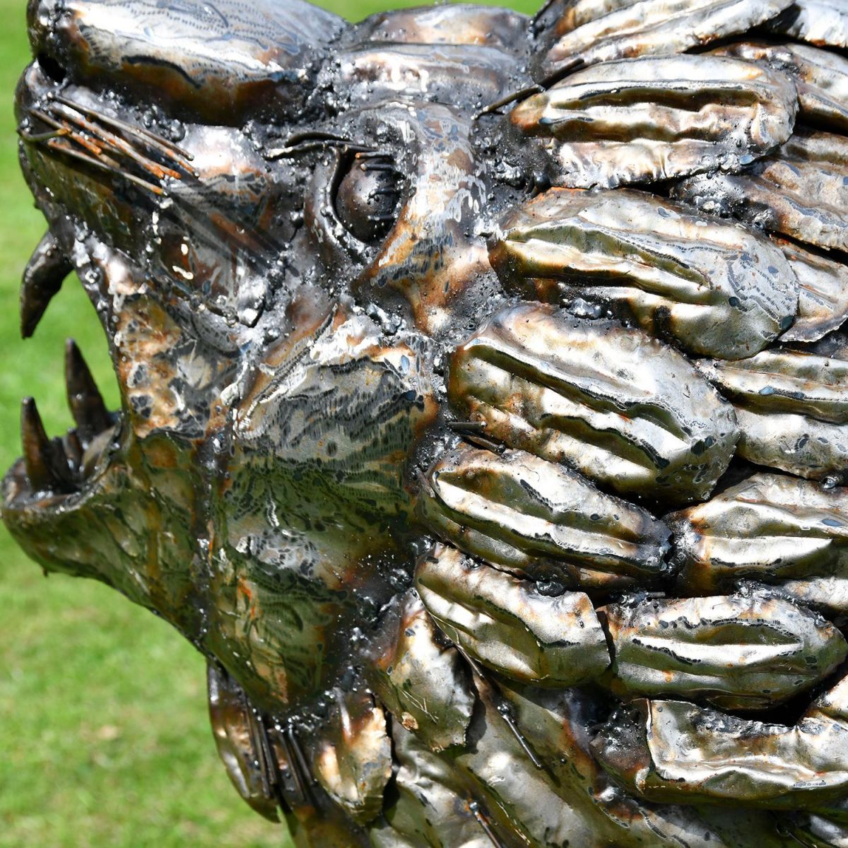 Close-up of the Detail on the Recycled Metal Roaring Lion Sculpture