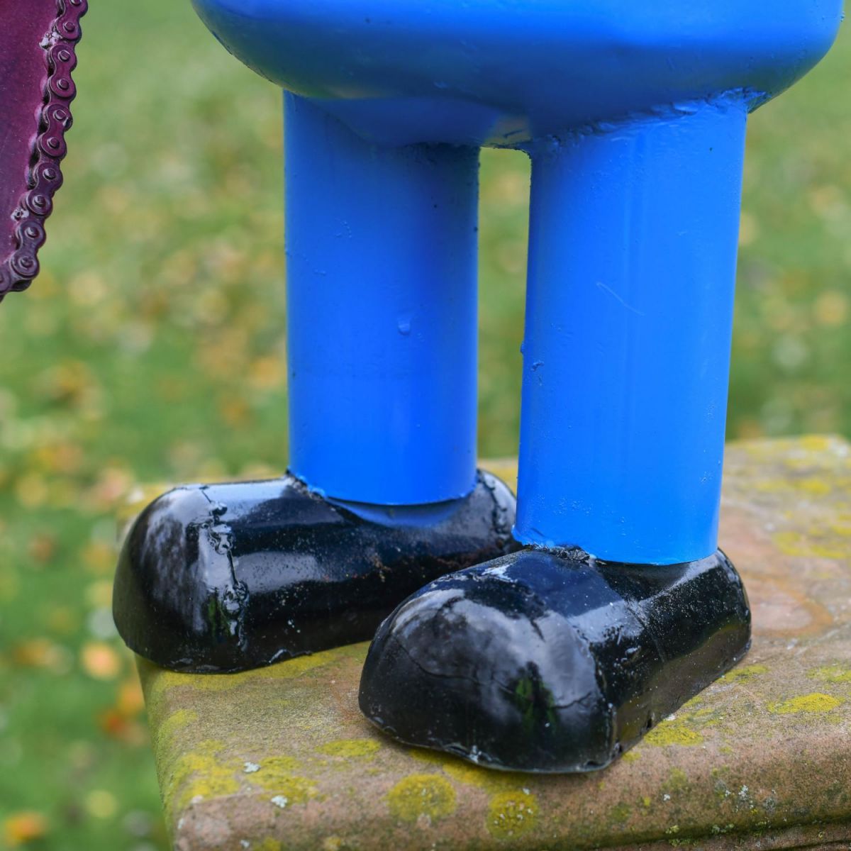 Close-Up of Feet on Minion Sculpture Close-Up of Feet on Minion Sculpture