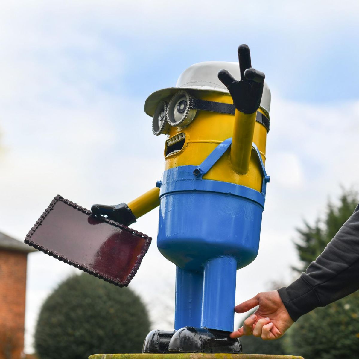 Recycled Metal "Town Planner" Minion Sculpture in Situ Recycled Metal "Town Planner" Minion Sculpture in Situ