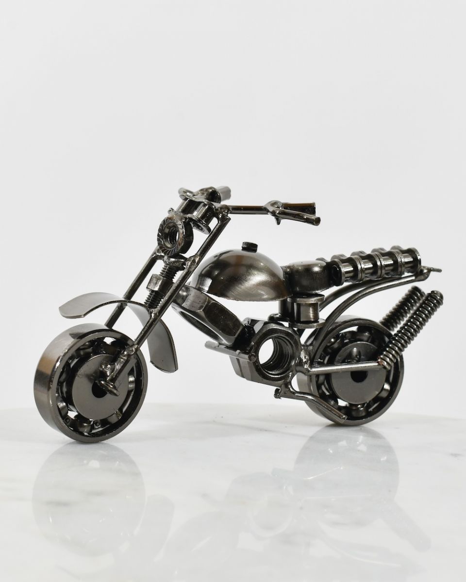 Recycled metal vintage motorbike sculpture Recycled metal vintage motorbike sculpture