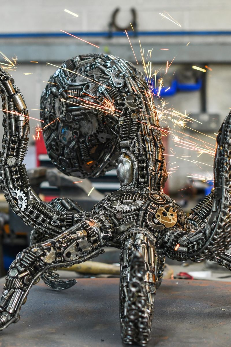 Close up of intricate detail on scrap metal octopus sculpture Close up of intricate detail on scrap metal octopus sculpture