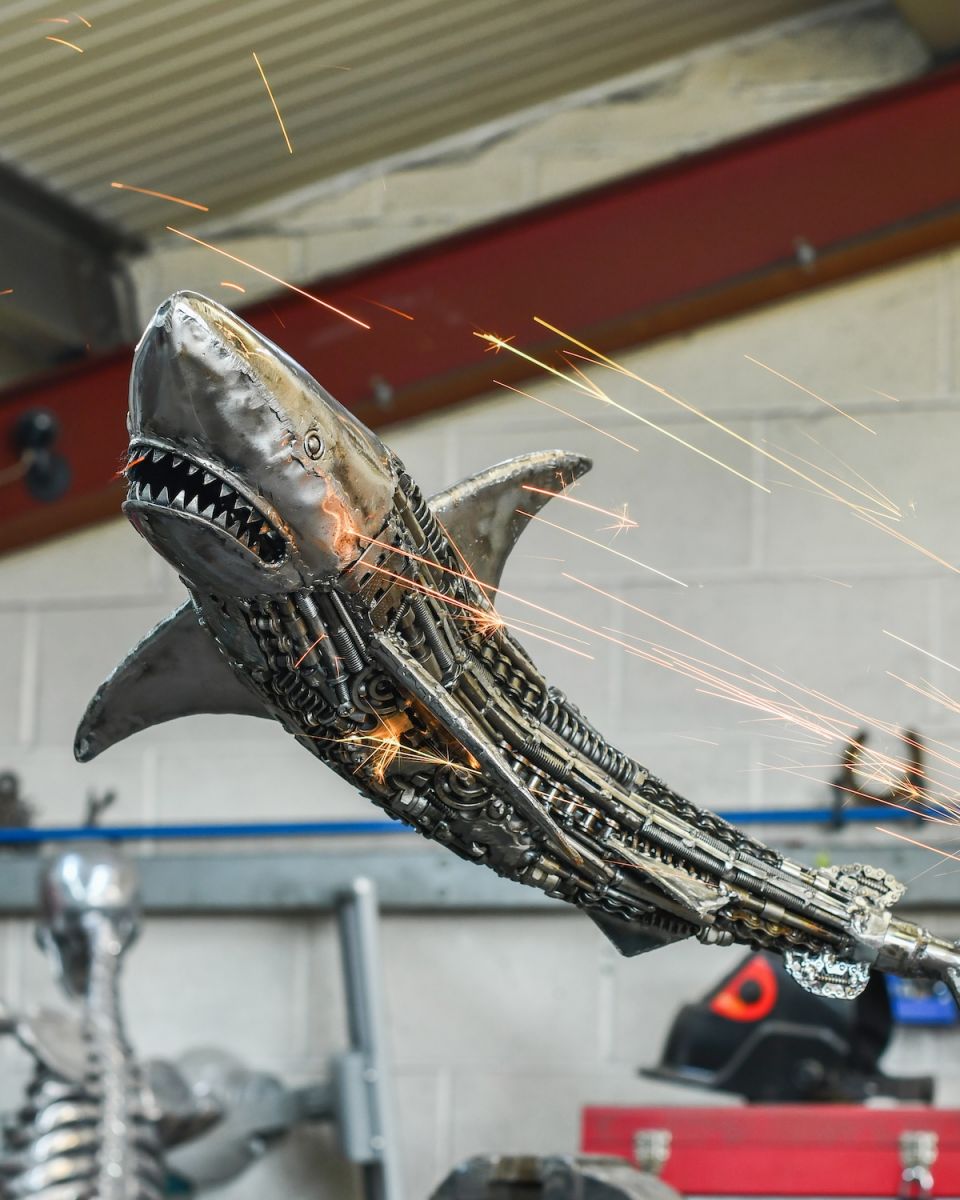 Close up of intricate detail on recycled metal shark sculpture Close up of intricate detail on recycled metal shark sculpture