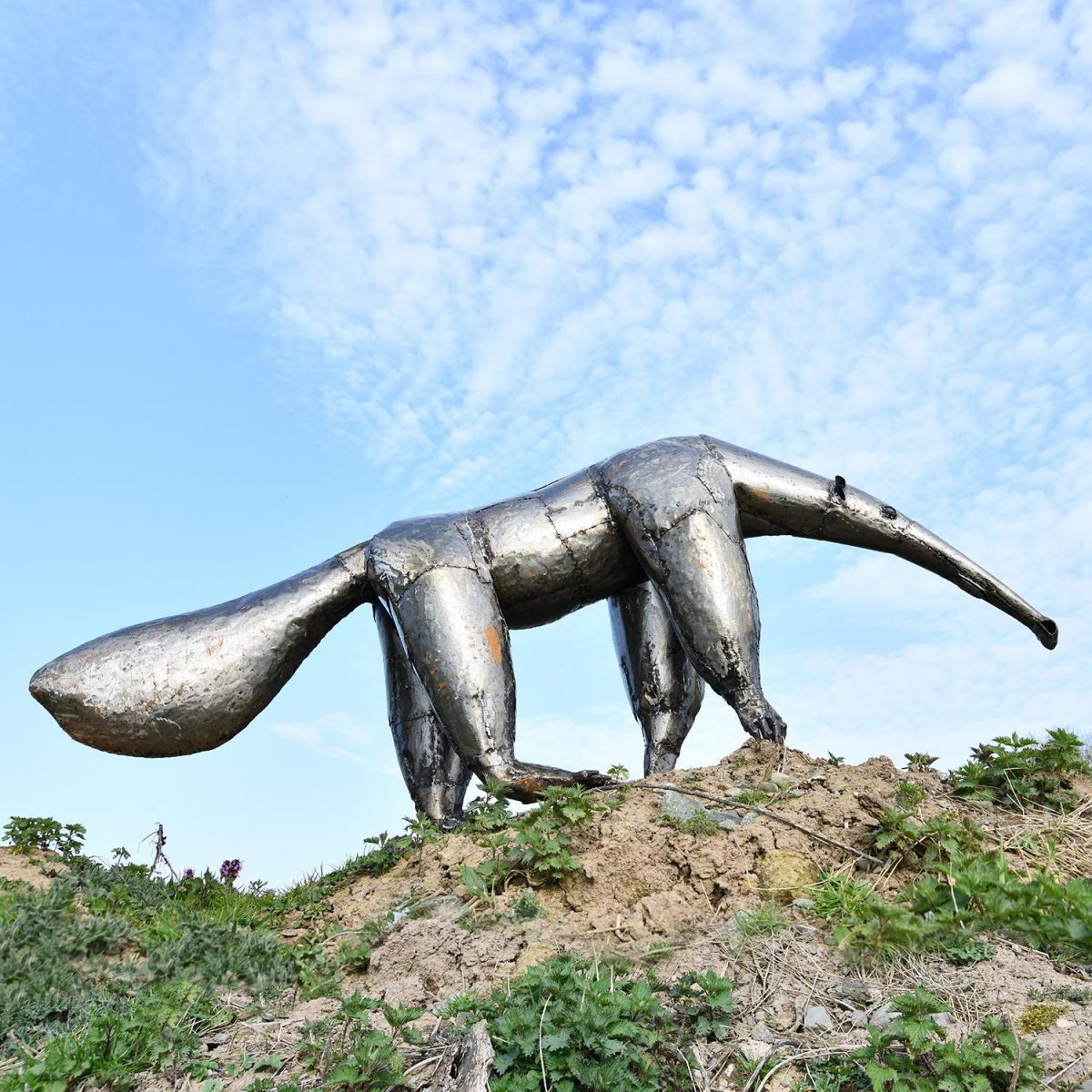 Recycled Steel Anteater Sculpture in Situ on a Mound