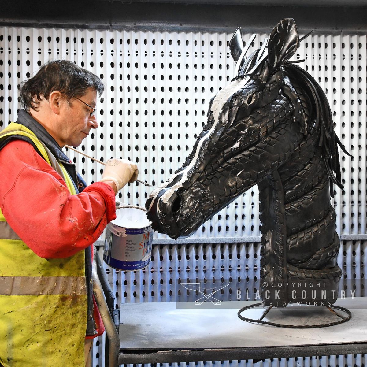 Recycled Car Tyre Horse Head Being Painted in Our Workshop