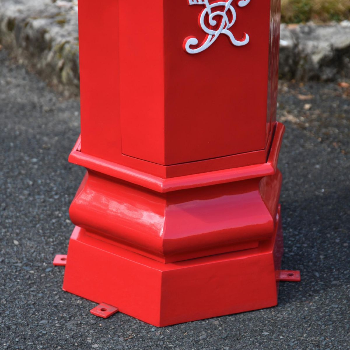 Close-Up of Base on Penfold Pillar Post Box - Red Finish Close-Up of Base on Penfold Pillar Post Box - Red Finish